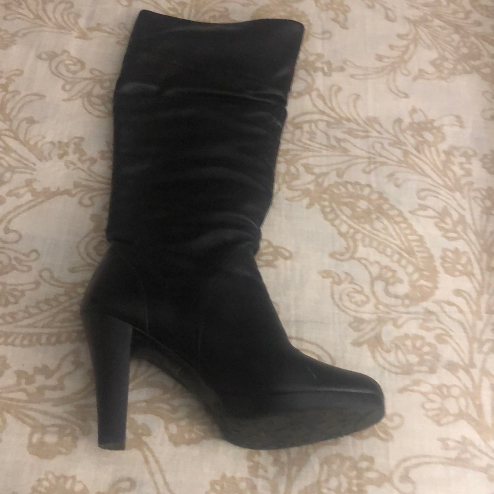Black Leather Boots by Matisse. The boots are Knee length and barely worn.